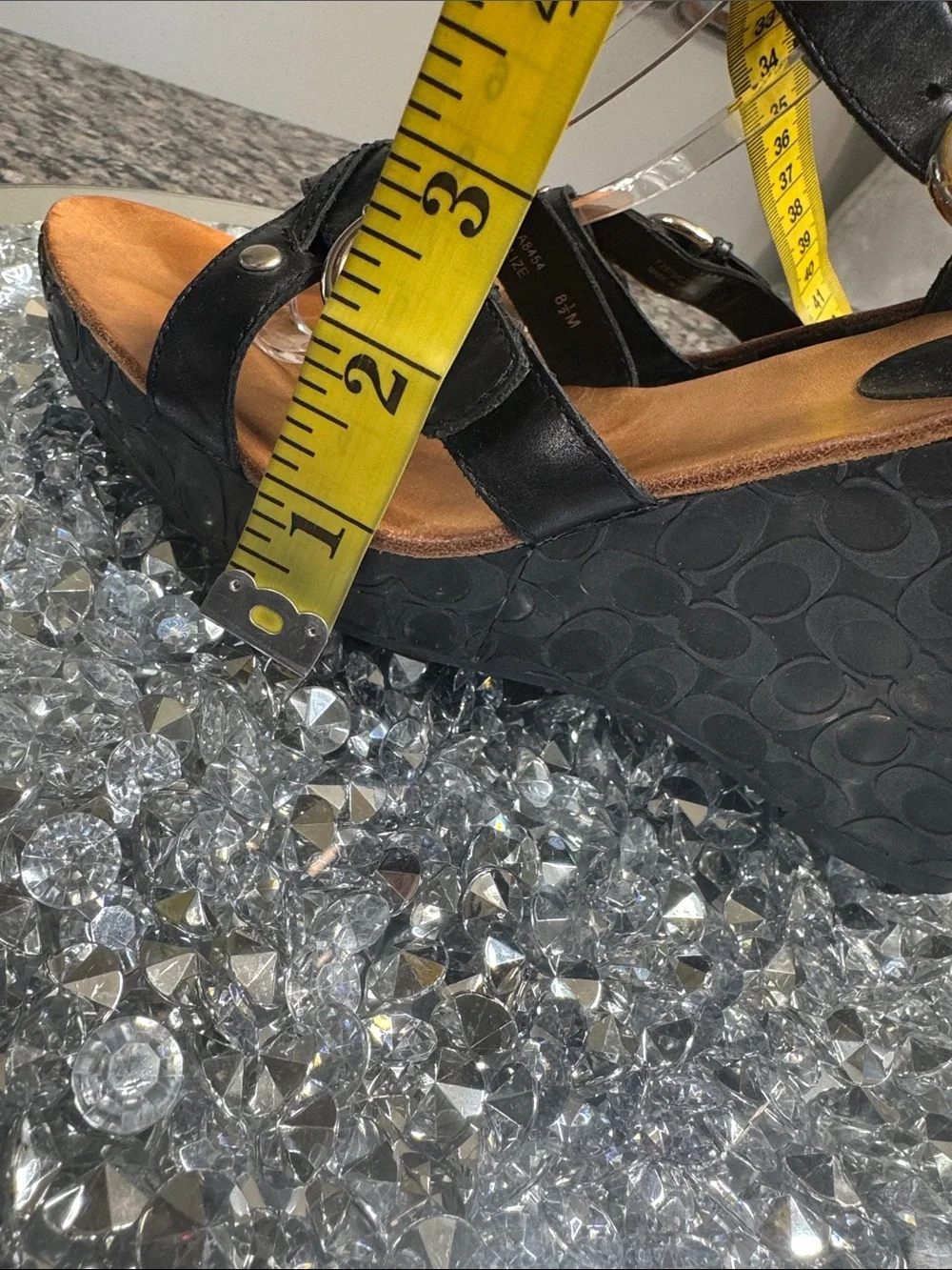 Coach Elize leather Black Logo-Embossed Wedge Sandals with Buckle Detail